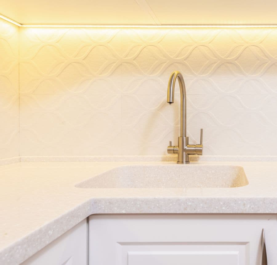 Kitchen sink and faucet checked for drainage slope