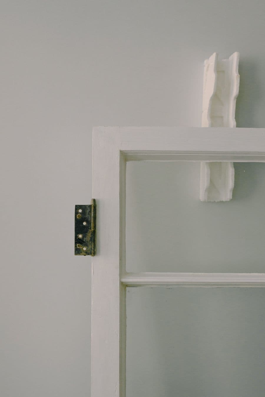 Close-up of a window frame checked for sealing gaps