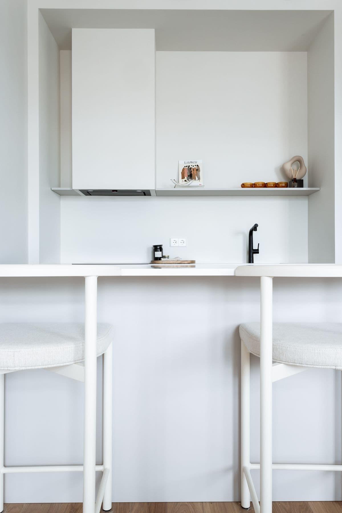 Modern kitchen with white cabinetry